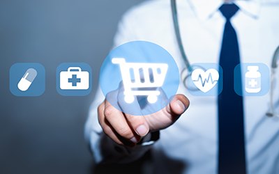Photo of a person touching an online medical shopping icon
