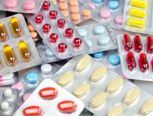 Miscellaneous colorful pills in packaging