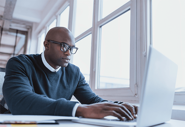 Man looking over results