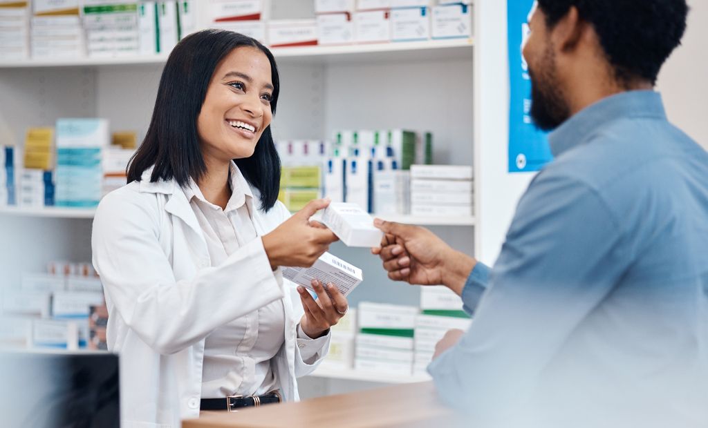 Pharmacist giving medication