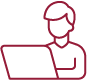 Icon of a person working on a laptop